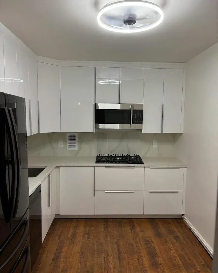 Renovated kitchen with quartz countertops in Acton